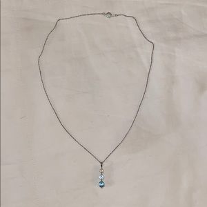 Necklace with three aqua marine stones
